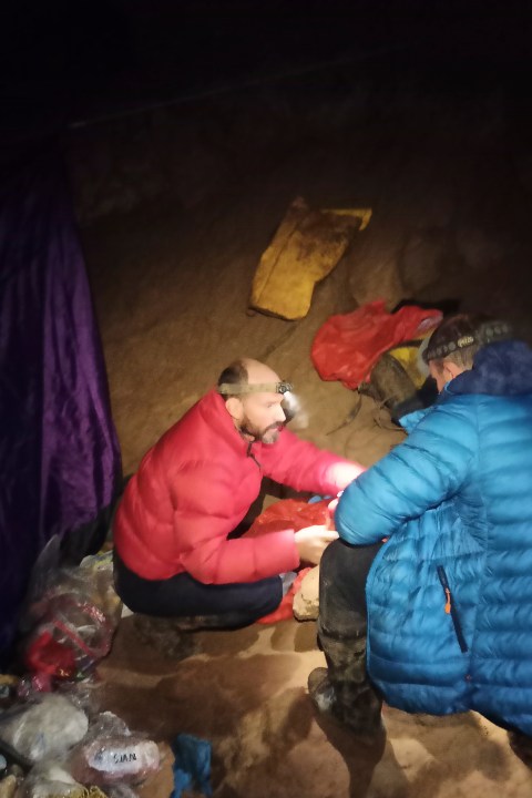 American caver Mark Dickey, left, 40, talks to a colleague inside the Morca cave near Anamur, southern Turkey, Thursday, Sept. 7, 2023. Turkish and international cave rescue experts are working to save an American speleologist trapped at a depth of more than 1,000 meters (3,280 feet) in a cave in southern Turkey after he became ill. (Turkish Government Directorate of Communications via AP)