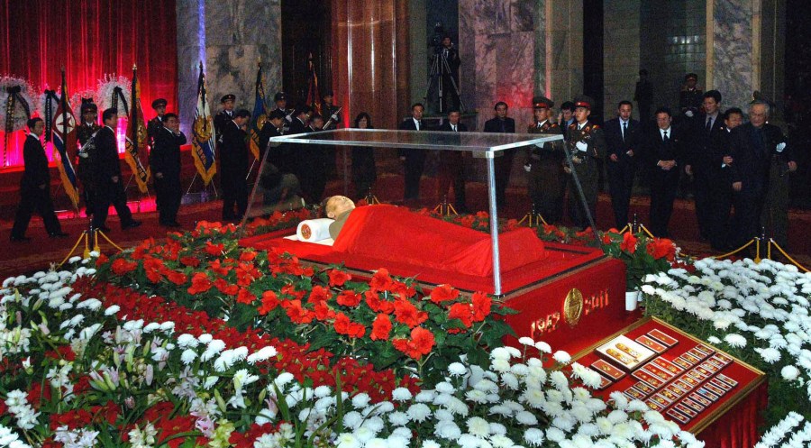 FILE - In this photo released on Dec. 20, 2011 by the Korean Central News Agency and distributed in Tokyo by the Korea News Service, the body of North Korean leader Kim Jong Il is laid in the Kumsusan Memorial Palace in Pyongyang, North Korea. North Korea’s Kim Jong Un's train journey to Russia has a storified history. The tradition of train travel extends across the generations. That’s in evidence at the massive Kumsusan Palace of the Sun, where reconstructions of Kim Jong Un’s father’s and grandfather’s train cars, and the leaders’ preserved and displayed remains, are enshrined. (Korean Central News Agency/Korea News Service via AP, File)