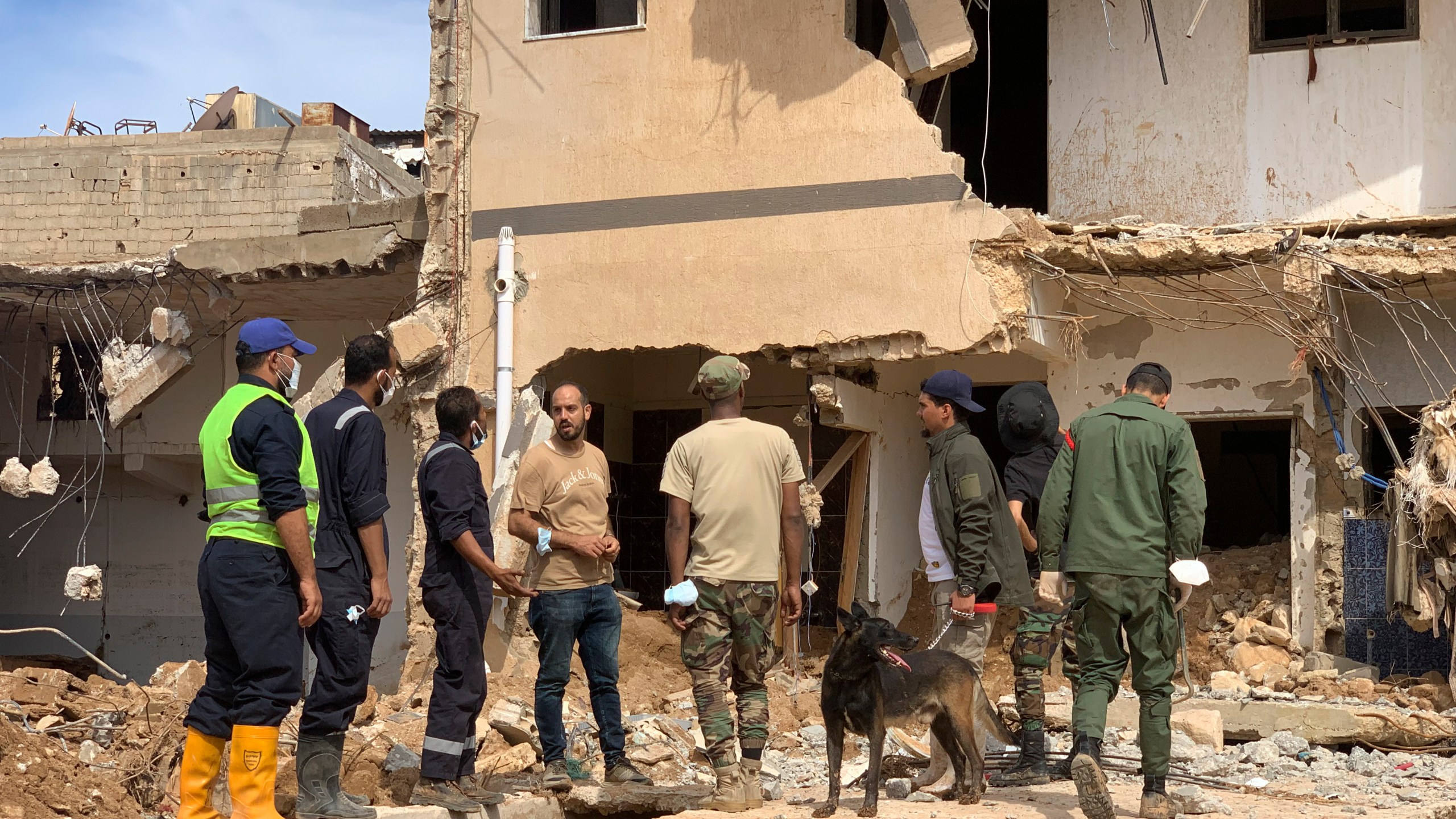 Rescue teams search for victims in Derna, Libya, on Sunday, Sept. 17, 2023. Libyan authorities have opened an investigation into the collapse of two dams that caused a devastating flood in a Derna as rescue teams searched for bodies on Saturday, nearly a week after the deluge killed more than 11,000 people. (AP Photo/Yousef Murad)