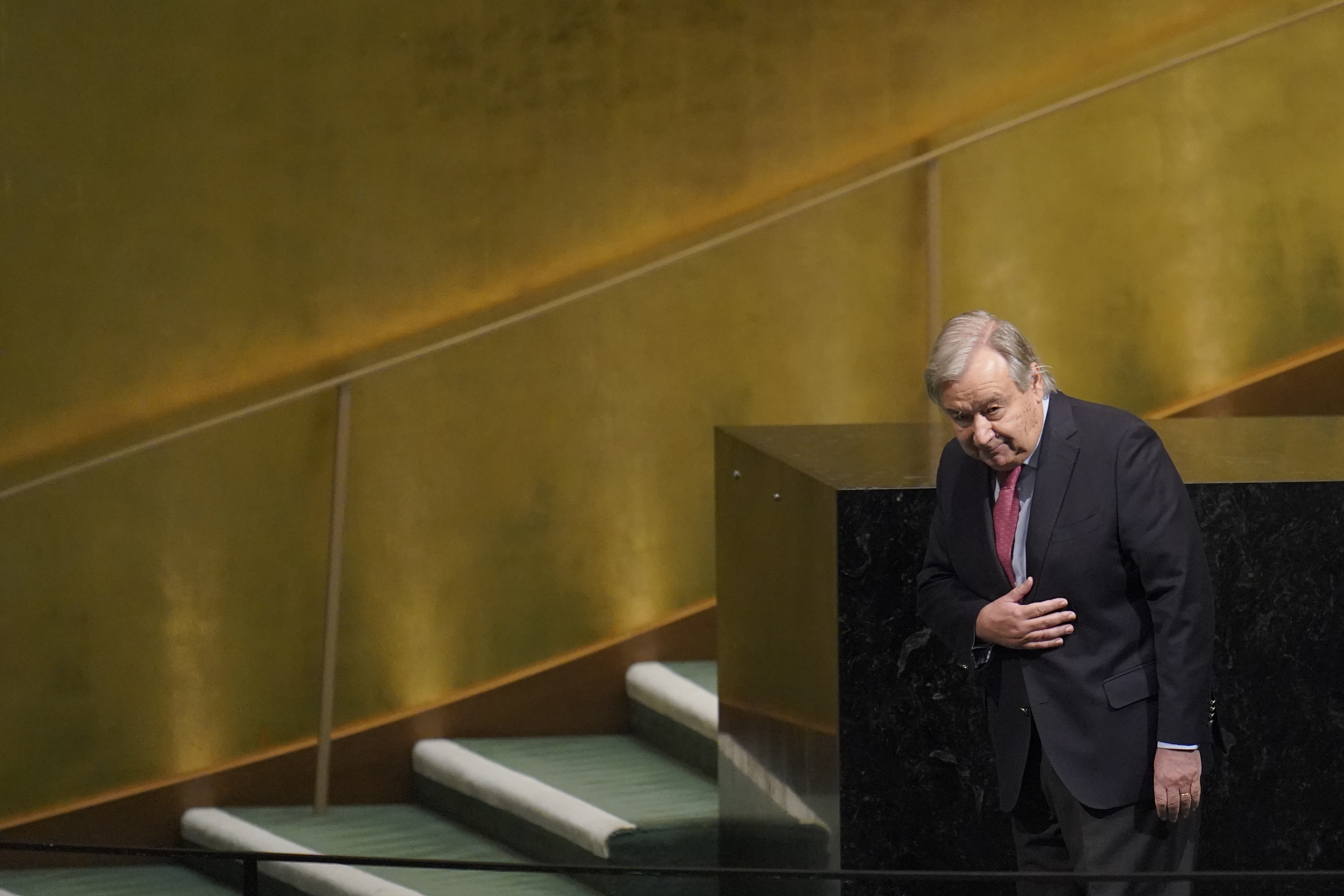 FILE - United Nations Secretary-General Antonio Guterres acknowledges the delegates applause as he leaves the podium after addressing the 77th session of the General Assembly at U.N. headquarters, Sept. 20, 2022. At the annual meeting of world leaders last year, the United Nations chief sounded a global alarm about the survival of humanity and the planet. In 2023, the alarm was louder and more ominous. (AP Photo/Mary Altaffer, File)