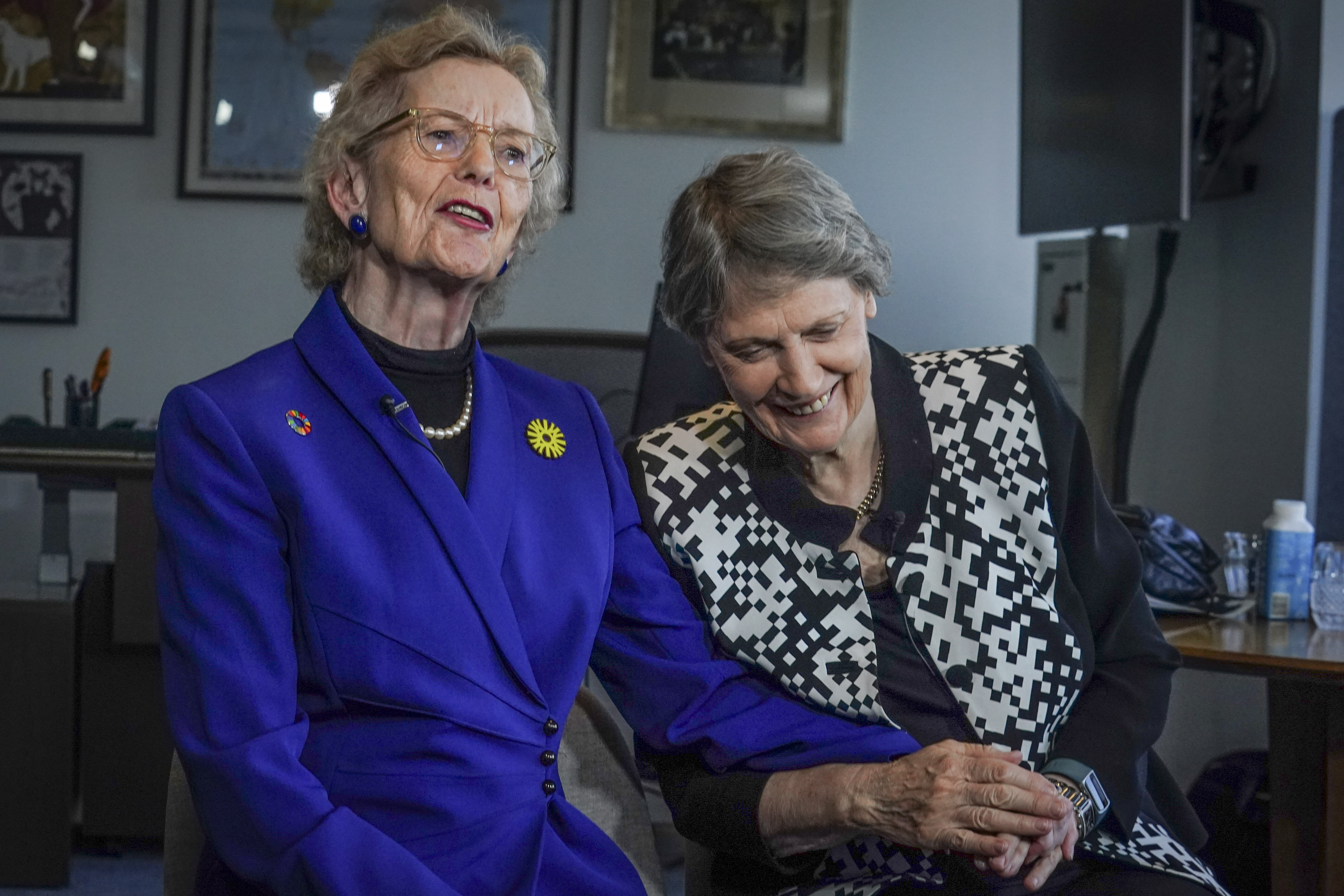 Former Irish President Mary Robinson, left, and former New Zealand Prime Minister Helen Clark, both members of Elders, "an independent group of global leaders working for peace, justice, human rights and a sustainable planet" founded by Nelson Mandela in 2007, hold an interview to discuss the group's progress, Wednesday Sept. 20, 2023, in New York. (AP Photo/Bebeto Matthews)