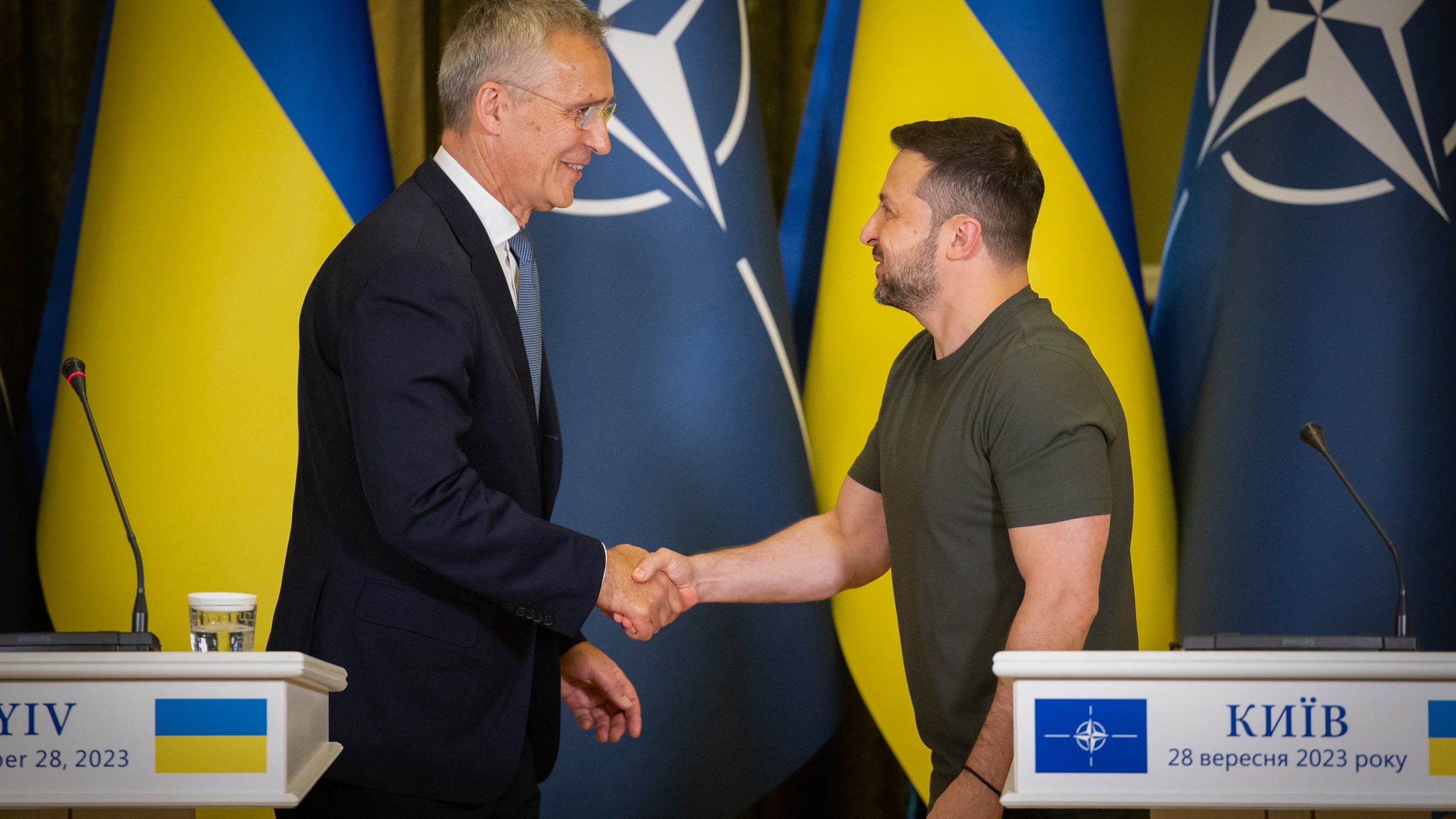 NATO Secretary General Jens Stoltenberg, left, and Ukrainian President Volodymyr Zelenskyy shake hands after their press conference in Kyiv, Ukraine, Thursday, Sept. 28, 2023. (Ukrainian Presidential Press Office via AP)