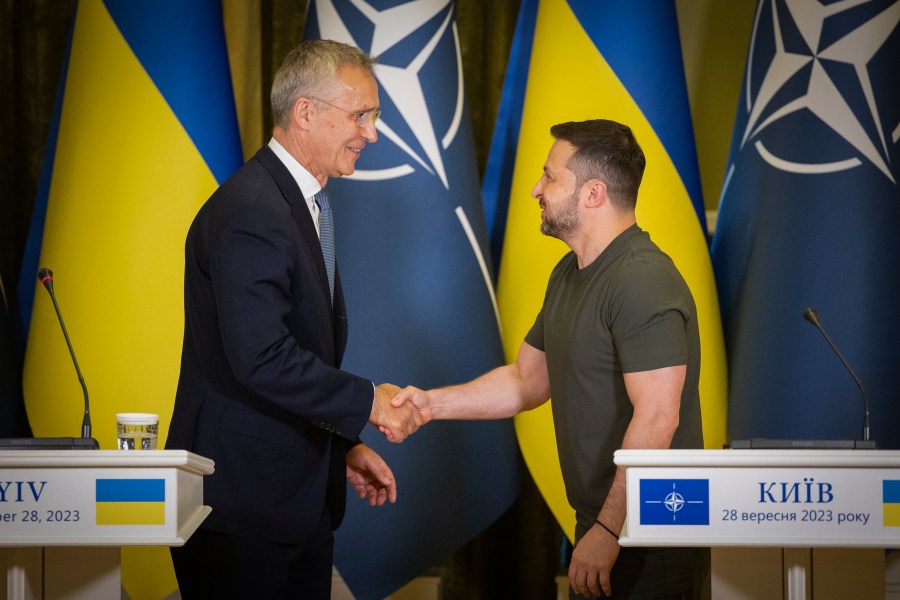 NATO Secretary General Jens Stoltenberg, left, and Ukrainian President Volodymyr Zelenskyy shake hands after their press conference in Kyiv, Ukraine, Thursday, Sept. 28, 2023. (Ukrainian Presidential Press Office via AP)