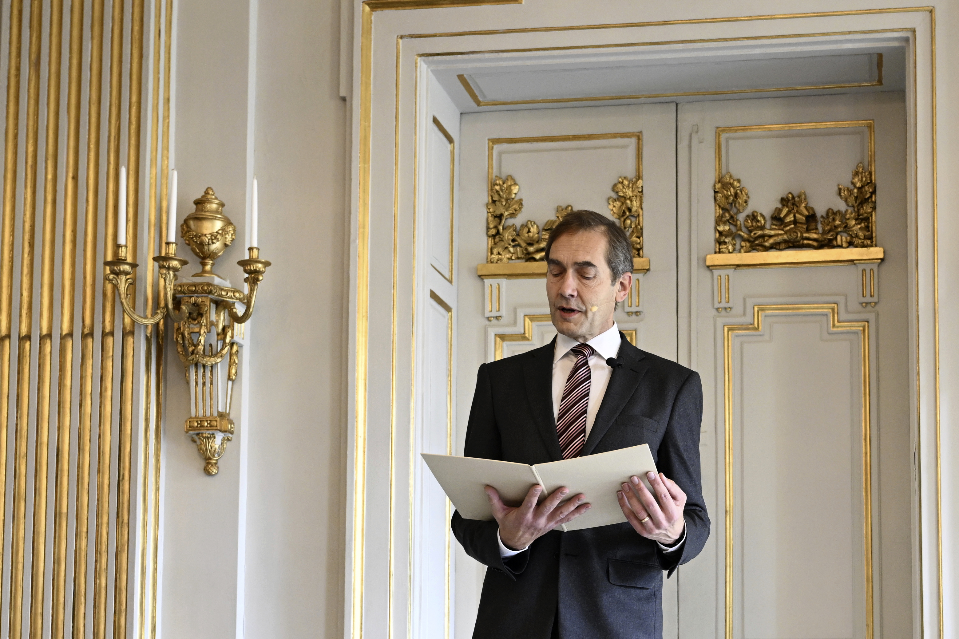 Mats Malm, Permanent Secretary at the Swedish Academy, announces the Nobel Prize in Literature, at the Stock Exchange in Stockholm, Thursday, Oct. 5, 2023. The Nobel Prize in literature has been awarded to Norwegian writer Jon Fosse for “his innovative plays and prose, which give voice to the unsayable,” according to the Swedish Academy. (Pontus Lundahl/TT News Agency via AP)