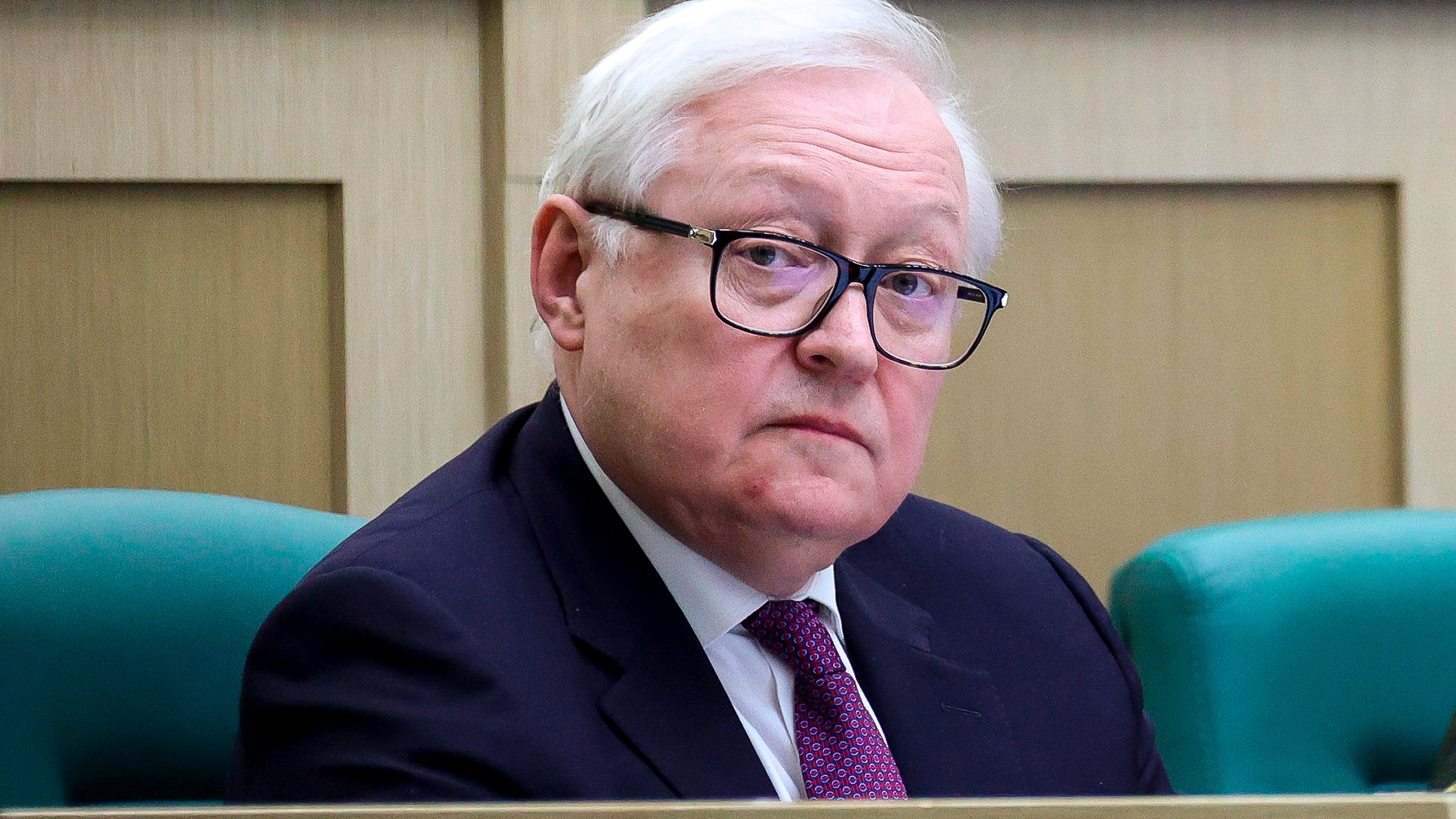 FILE - In this photo released by The Federal Assembly of The Russian Federation, Russian Deputy Foreign Minister Sergei Ryabkov attends a session of the Federal Assembly in Moscow, Russia, Wednesday, April 12, 2023. Deputy Foreign Minister Sergei Ryabkov told reporters that Moscow will rescind the ratification of the nuclear test ban treaty to "mirror" the action by the U.S. He added that if the U.S. conducts a nuclear test, "we will be forced to mirror that as well." (The Federal Assembly of The Russian Federation via AP, File)