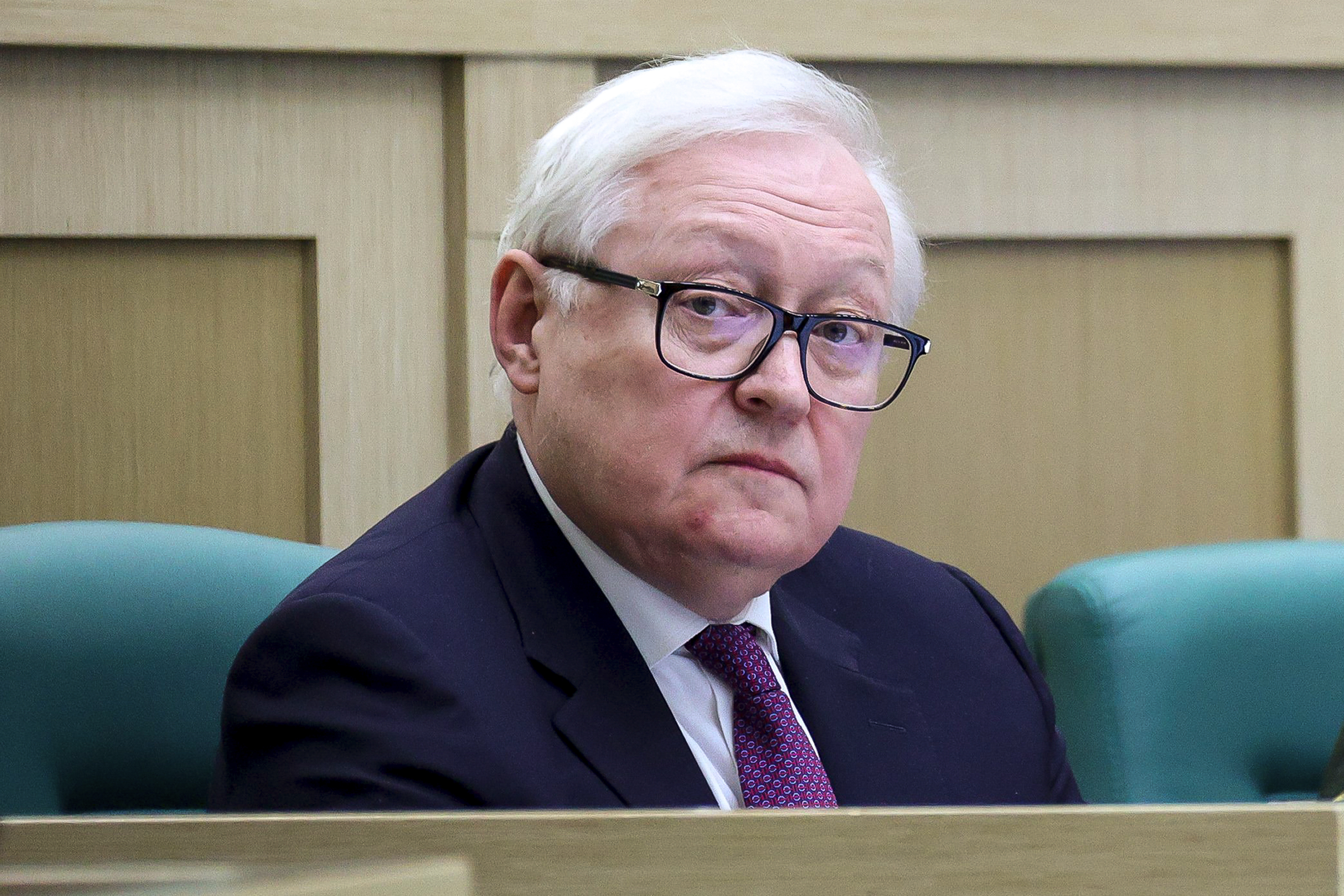 FILE - In this photo released by The Federal Assembly of The Russian Federation, Russian Deputy Foreign Minister Sergei Ryabkov attends a session of the Federal Assembly in Moscow, Russia, Wednesday, April 12, 2023. Deputy Foreign Minister Sergei Ryabkov told reporters that Moscow will rescind the ratification of the nuclear test ban treaty to "mirror" the action by the U.S. He added that if the U.S. conducts a nuclear test, "we will be forced to mirror that as well." (The Federal Assembly of The Russian Federation via AP, File)