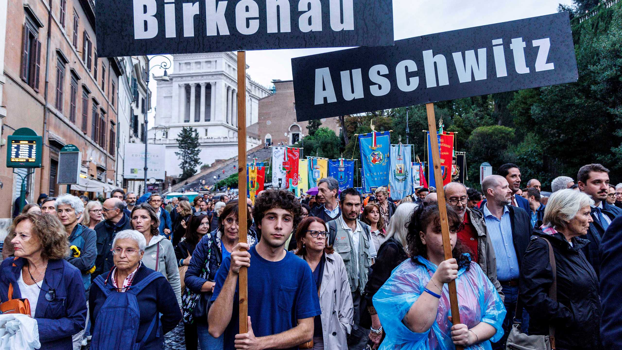 People participate in a march of remembrance marking the 80th anniversary of the roundup of the Jews of Rome in Rome, Italy, Monday Oct. 16, 2023. Italian lawmakers on Monday marked the 80th anniversary of the Nazi roundup of more than 1,200 Roman Jews in the Holocaust with a debate on a measure to partially fund a long-delayed Holocaust Museum in the capital. (Roberto Monaldo/LaPresse via AP)