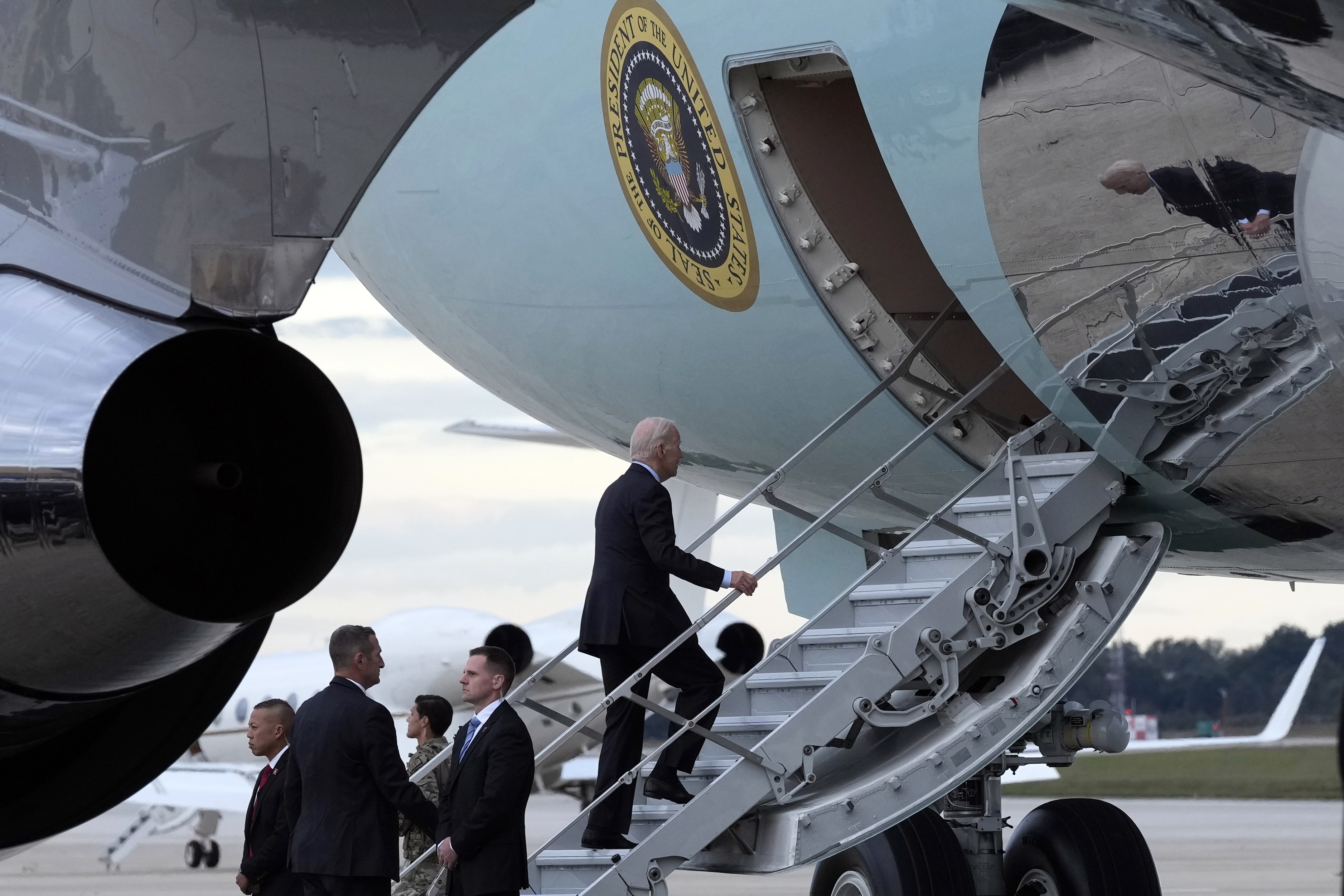 President Joe Biden walks up the steps of Air Force One at Andrews Air Force Base, Md., Tuesday, Oct. 17, 2023, as he heads to Israel. (AP Photo/Susan Walsh)