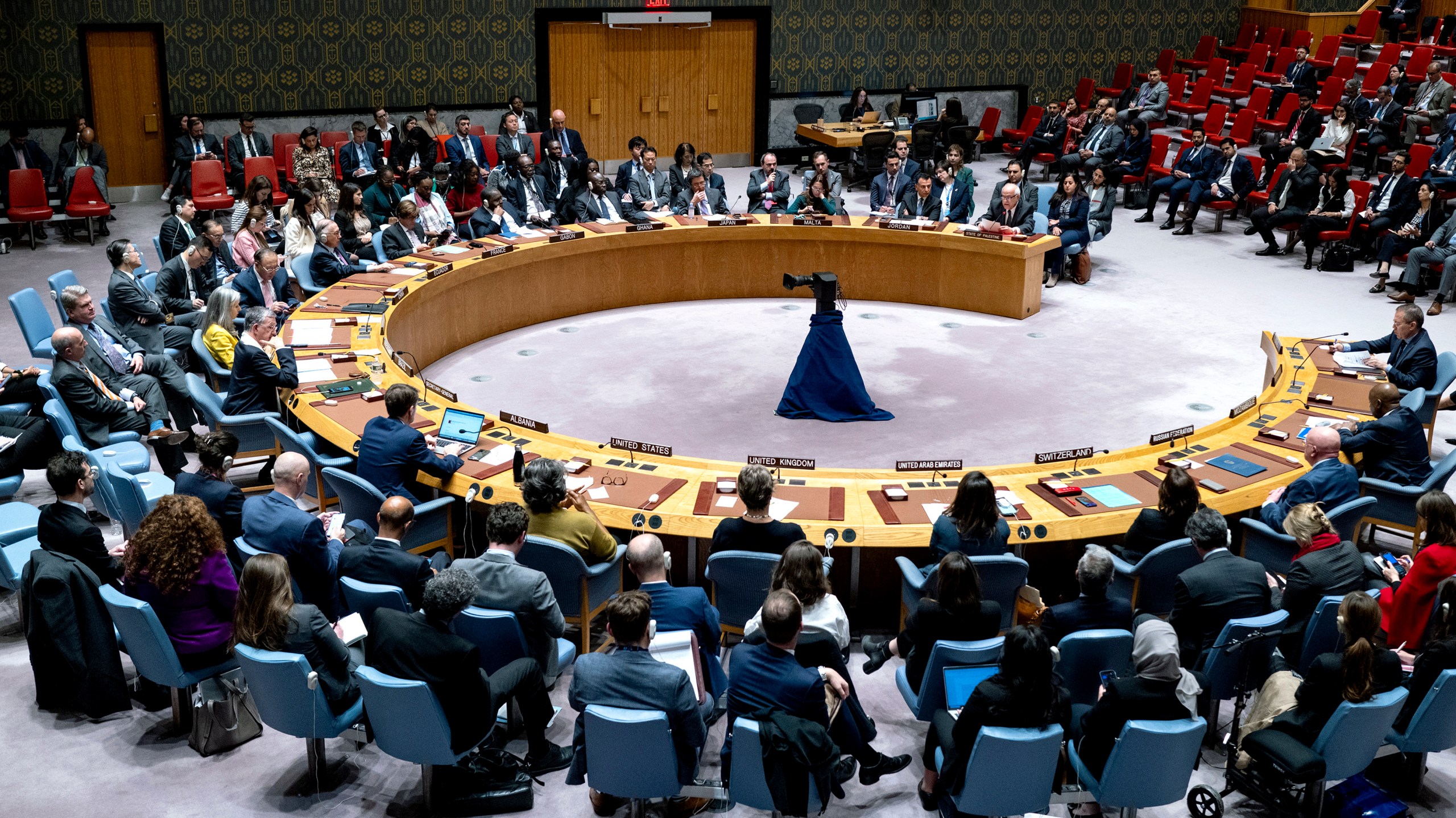 Palestinian U.N. ambassador Riyad Mansour, background right, addresses members of the U.N. Security Council at United Nations headquarters Monday, Oct. 16, 2023. (AP Photo/Craig Ruttle)