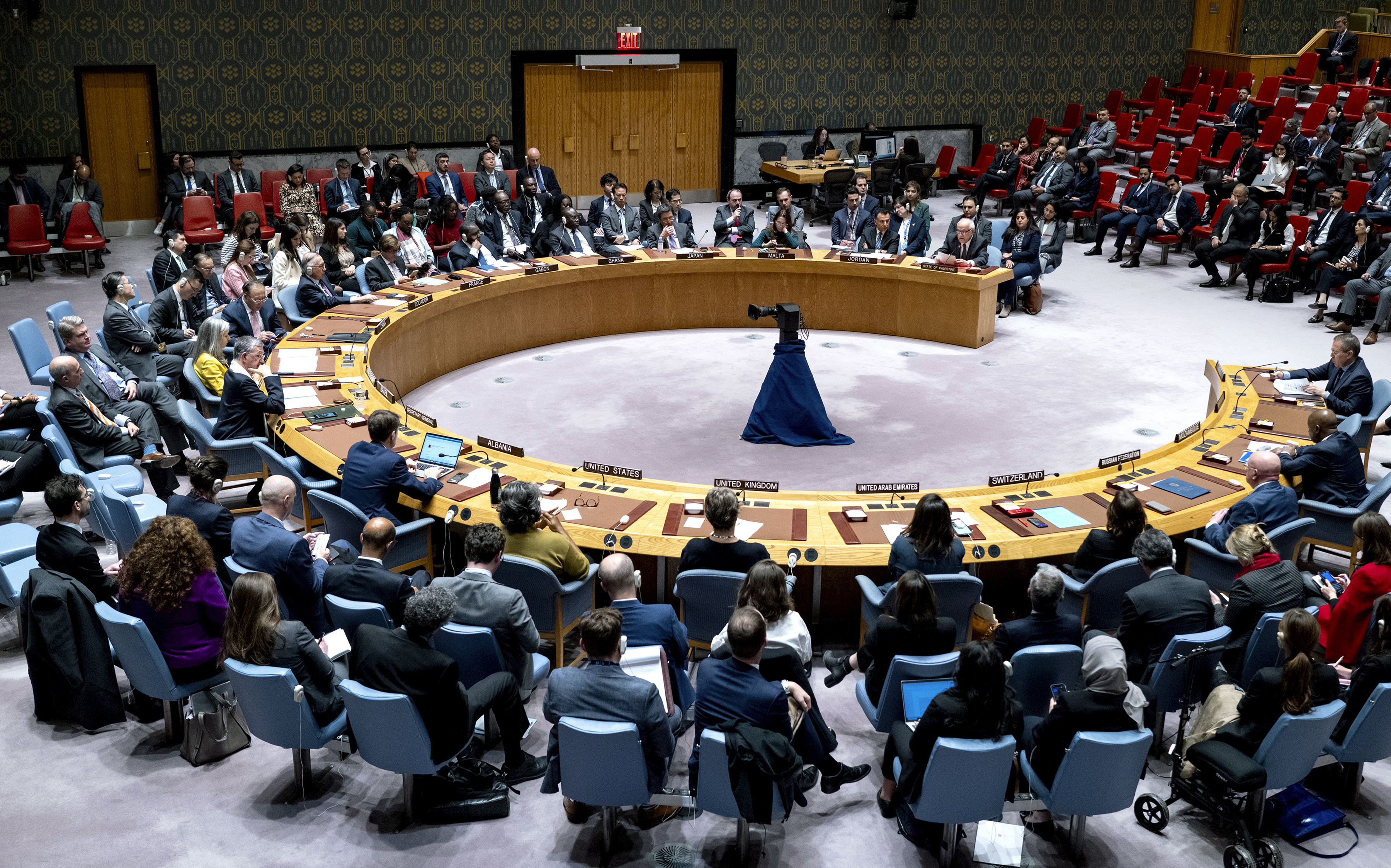 Palestinian U.N. ambassador Riyad Mansour, background right, addresses members of the U.N. Security Council at United Nations headquarters Monday, Oct. 16, 2023. (AP Photo/Craig Ruttle)