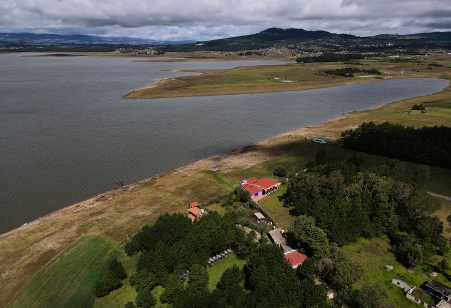 The banks of the Villa Victoria reservoir are exposed due to low water levels in the state of Mexico, Tuesday, Oct. 10, 2023. The capital’s reservoirs like Villa Victoria are running historically low following a “too dry” summer, according to official data, and as the rainy season draws to a close, water restrictions have already begun. (AP Photo/Marco Ugarte)