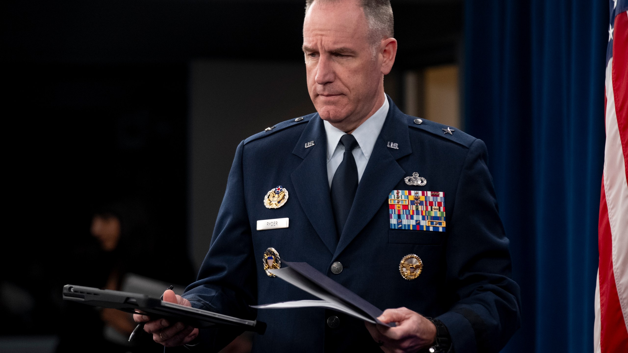 Pentagon spokesman Air Force Brig. Gen. Patrick Ryder arrives for a briefing at the Pentagon in Washington, Thursday, Oct. 19, 2023. (AP Photo/Andrew Harnik)