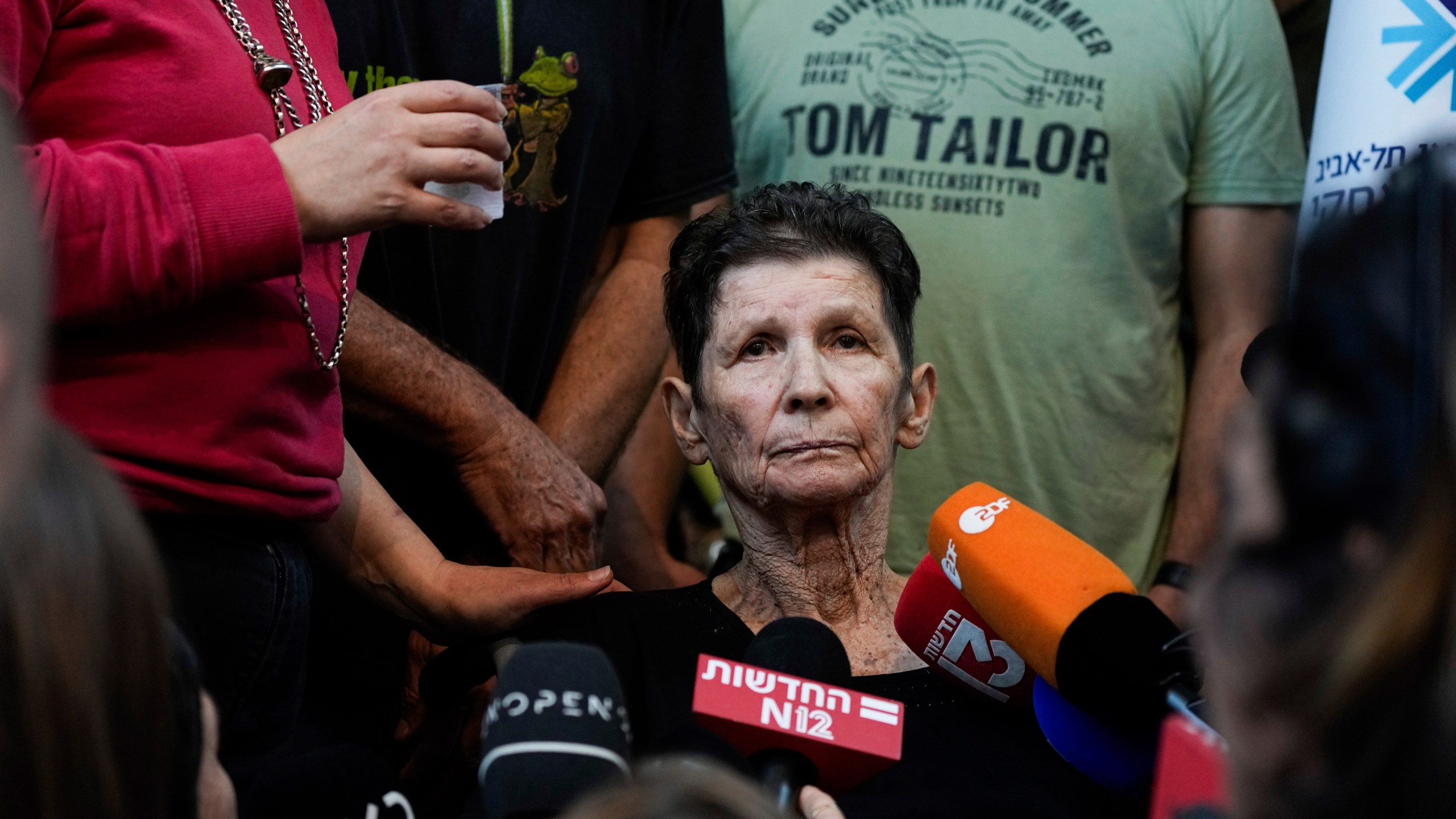 Yocheved Lifshitz, 85, who was held hostage in Gaza after being abducted during Hamas' bloody Oct. 7 attack on Israel, speaks to members of the press a day after being released by Hamas militants, at Ichilov Hospital in Tel Aviv, Israel, Tuesday, Oct. 24, 2023. (AP Photo/Ariel Schalit)