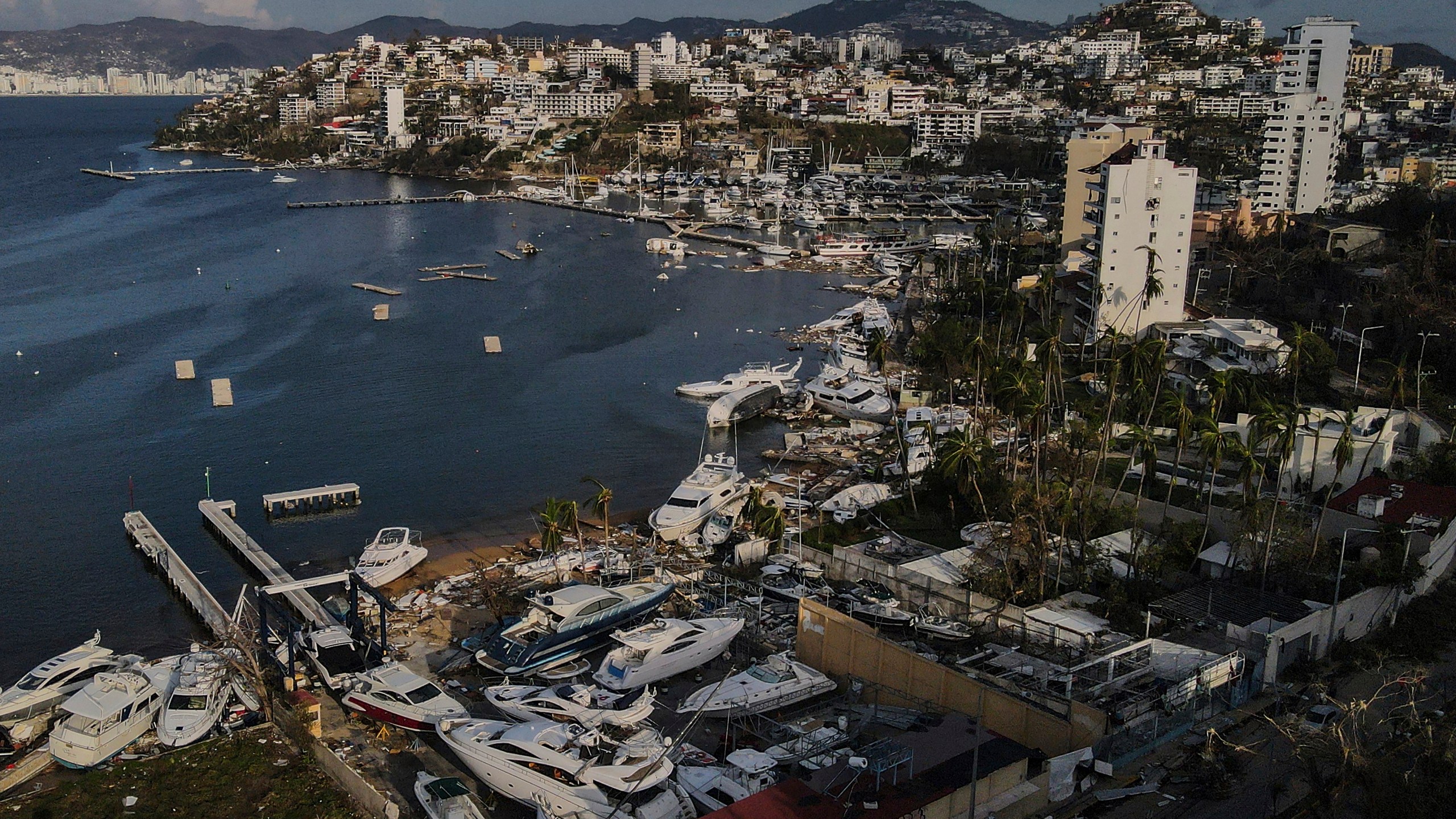 Damage is seen at a yacht club in the aftermath of Hurricane Otis in Acapulco, Mexico, Saturday, Oct. 28, 2023. (AP Photo/Felix Marquez)