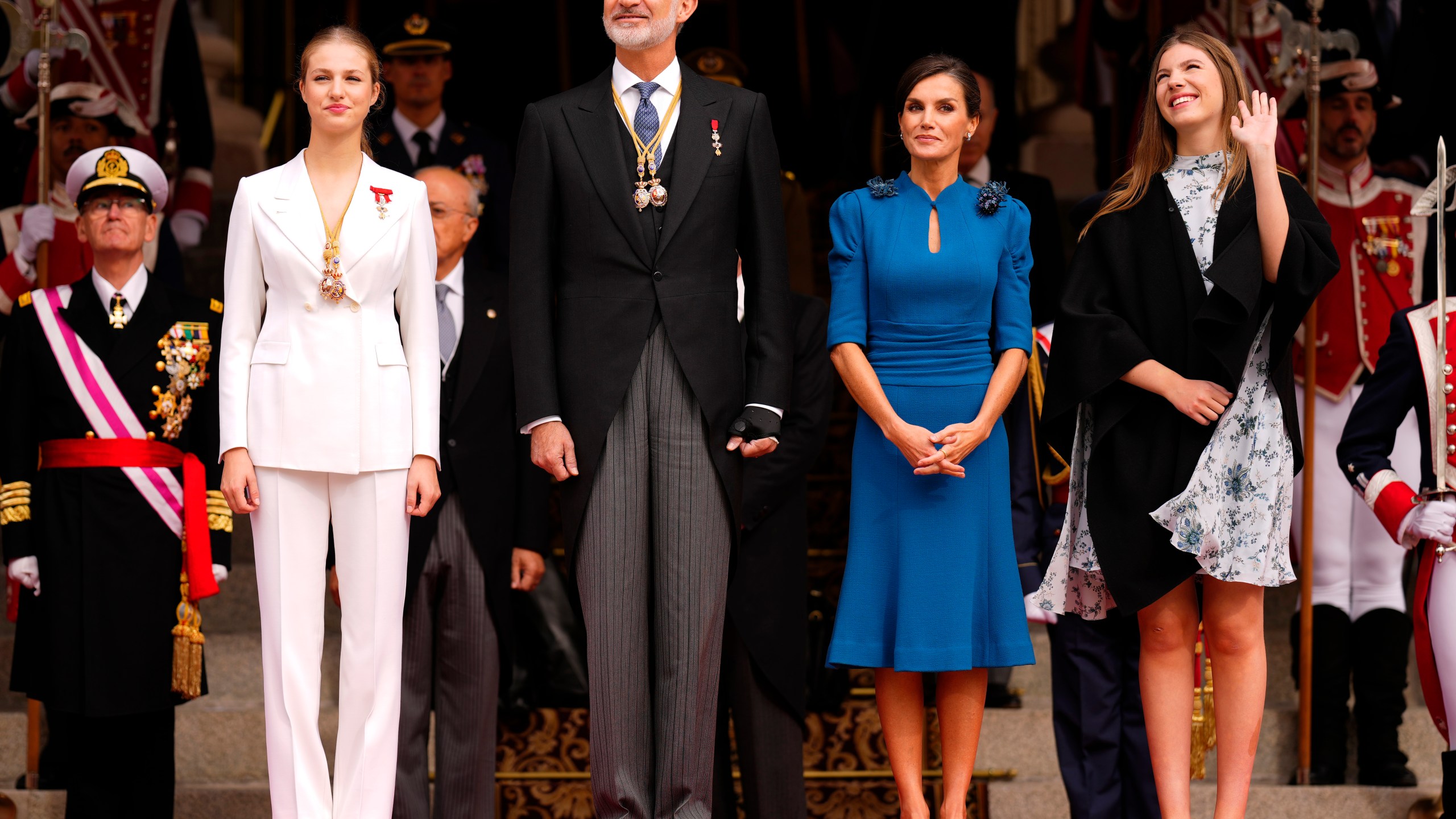 Princess Leonor, left, next to Spanish King Felipe VI, Queen Letizia and her sister Sofia, right, attend a military parade after swearing allegiance to the Constitution during a gala event that makes her eligible to be queen one day, in Madrid on Tuesday, Oct. 31 2023. The heir to the Spanish throne, Princess Leonor, has sworn allegiance to the Constitution on her 18th birthday. Tuesday's gala event paves the way to her becoming queen when the time comes. Leonor is the eldest daughter of King Felipe and Queen Letizia. (AP Photo/Manu Fernandez)