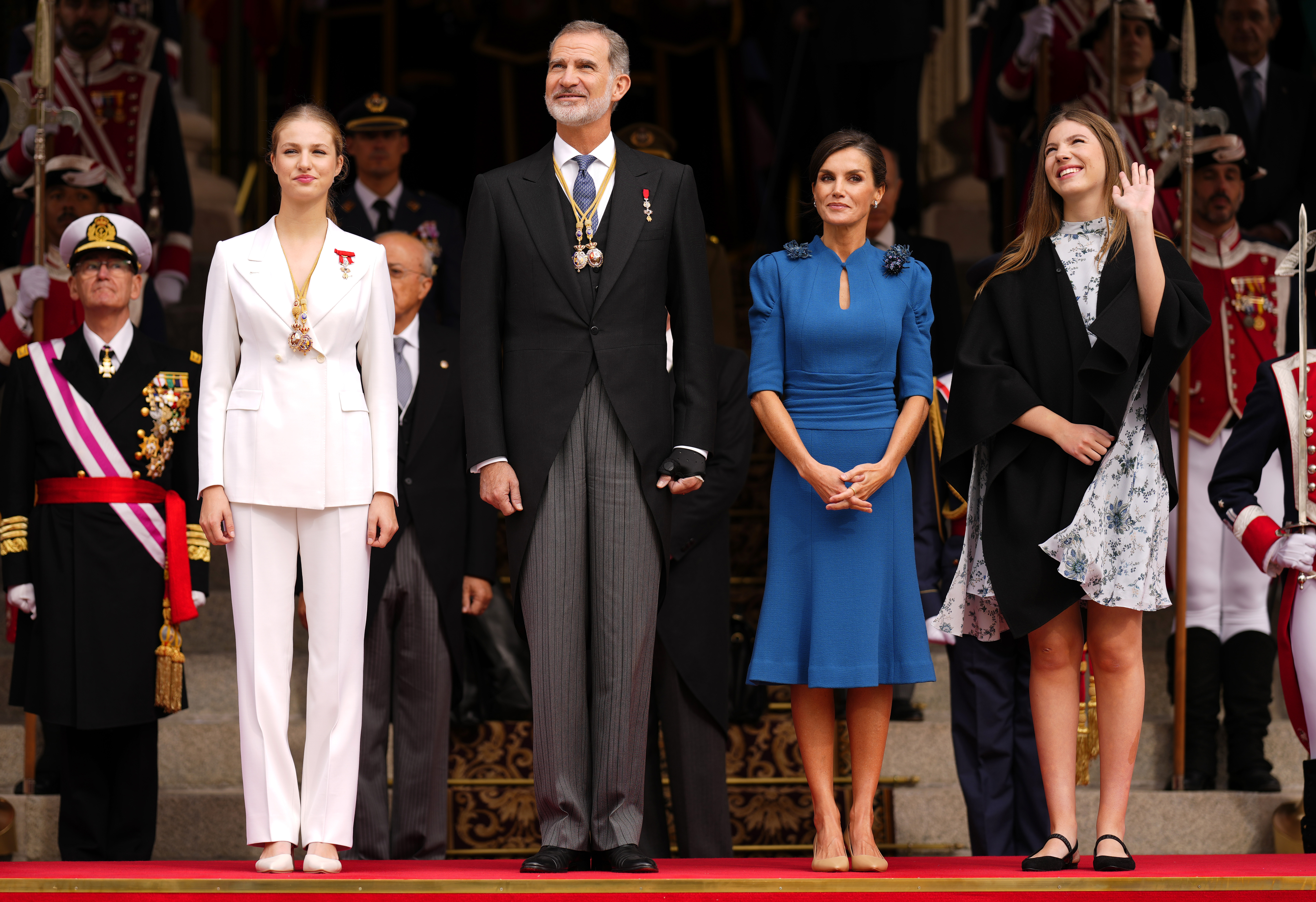 Princess Leonor, left, next to Spanish King Felipe VI, Queen Letizia and her sister Sofia, right, attend a military parade after swearing allegiance to the Constitution during a gala event that makes her eligible to be queen one day, in Madrid on Tuesday, Oct. 31 2023. The heir to the Spanish throne, Princess Leonor, has sworn allegiance to the Constitution on her 18th birthday. Tuesday's gala event paves the way to her becoming queen when the time comes. Leonor is the eldest daughter of King Felipe and Queen Letizia. (AP Photo/Manu Fernandez)