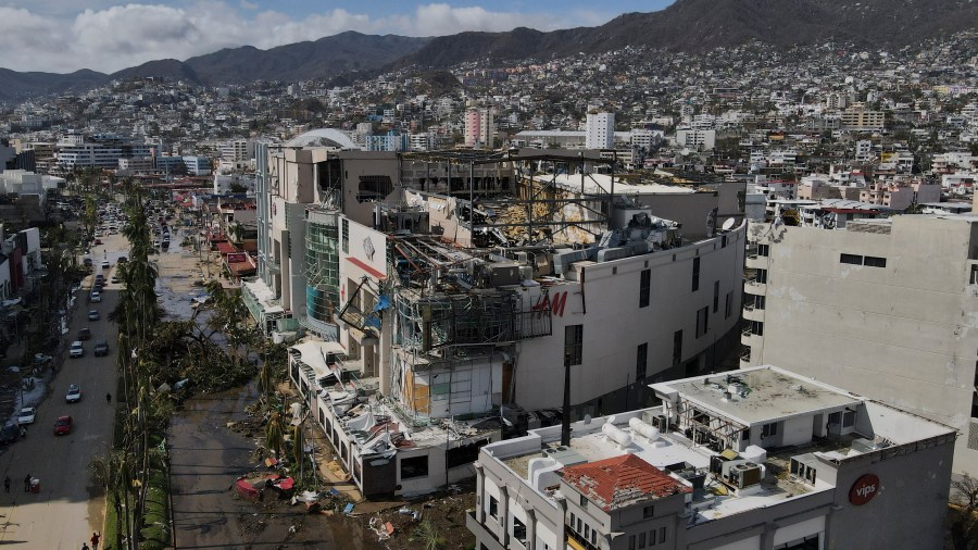 Damaged buildings stand after Hurricane Otis ripped through Acapulco, Mexico, Thursday, Oct. 26, 2023. The hurricane that strengthened swiftly before slamming into the coast early Wednesday as a Category 5 storm has killed at least 27 people as it devastated Mexico's resort city of Acapulco. (AP Photo/Felix Marquez)