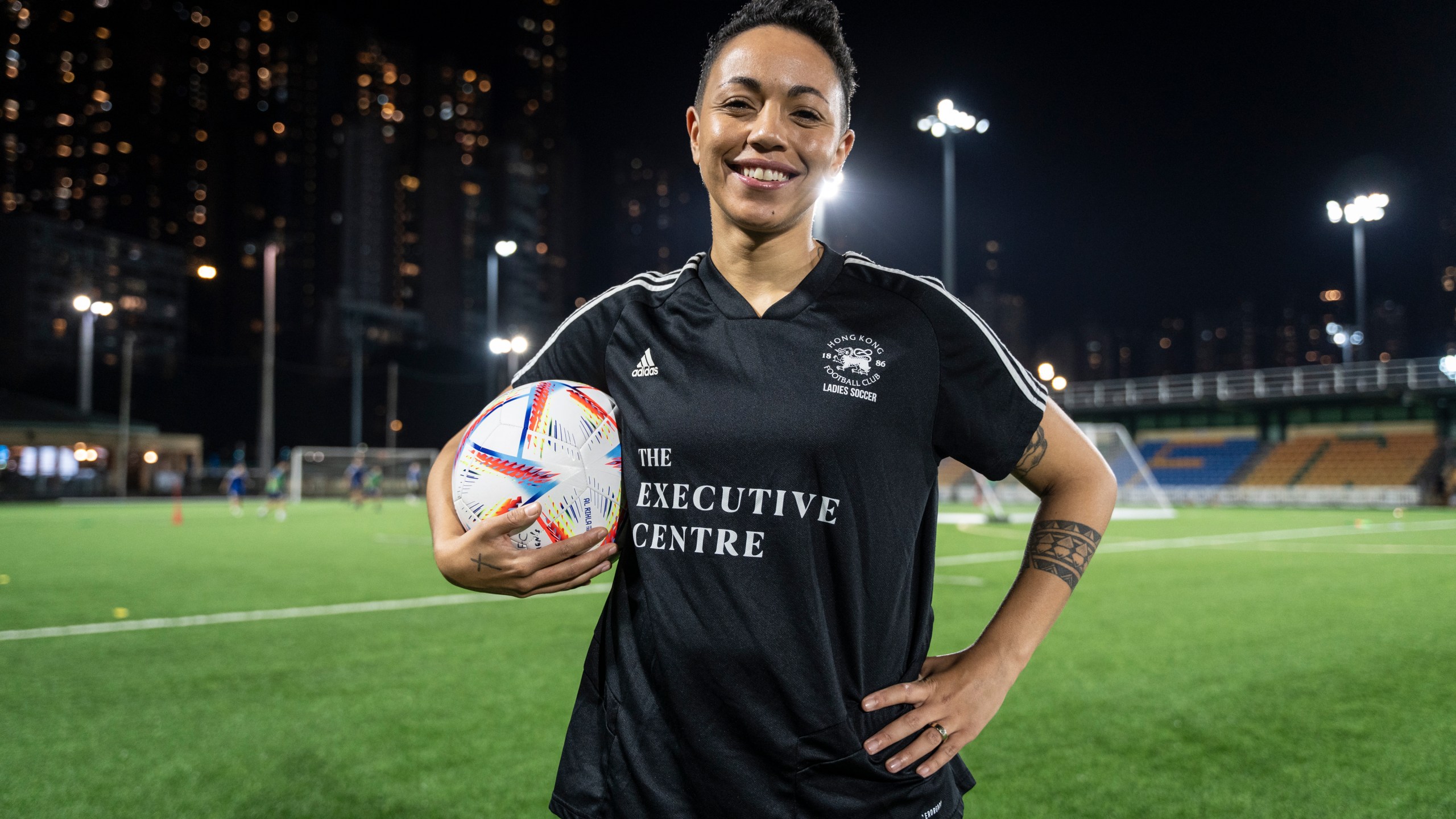 Gina Benjamin, vice captain of a Women's seven-a-side team, poses for photographs during an interview in Hong Kong, Tuesday, Oct. 31, 2023. Set to launch on Friday, Nov. 3, 2023, the first Gay Games in Asia are fostering hopes for wider LGBTQ+ inclusion in the Asian financial hub. (AP Photo/Chan Long Hei)