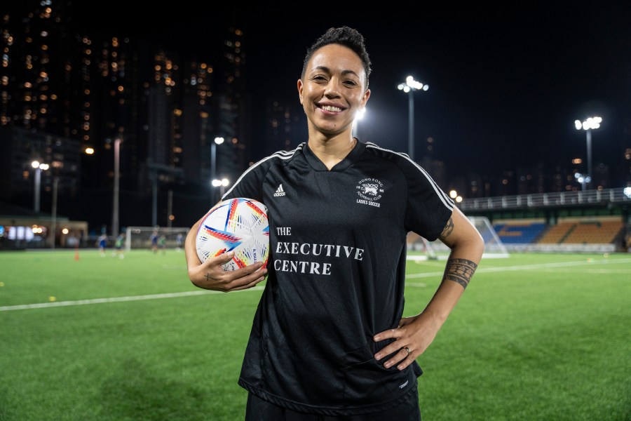 Gina Benjamin, vice captain of a Women's seven-a-side team, poses for photographs during an interview in Hong Kong, Tuesday, Oct. 31, 2023. Set to launch on Friday, Nov. 3, 2023, the first Gay Games in Asia are fostering hopes for wider LGBTQ+ inclusion in the Asian financial hub. (AP Photo/Chan Long Hei)