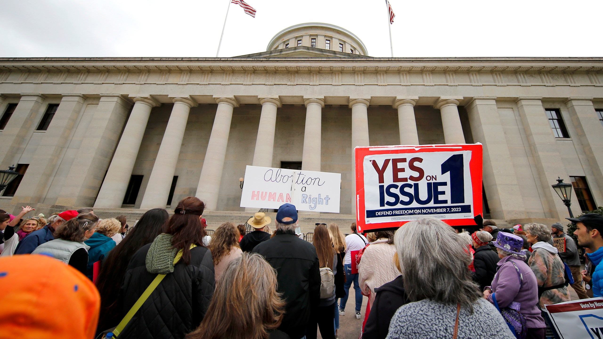 FILE - Supporters of Issue 1 attend a rally for the Right to Reproductive Freedom amendment held by Ohioans United for Reproductive Rights at the Ohio State House in Columbus, Ohio, Oct. 8, 2023. Campaigning over the issue, which will be decided Tuesday, is expected to be a preview of abortion battles across the country in 2024. The measure, known as Issue 1, is the only abortion question on any state ballot this year. (AP Photo/Joe Maiorana, File)