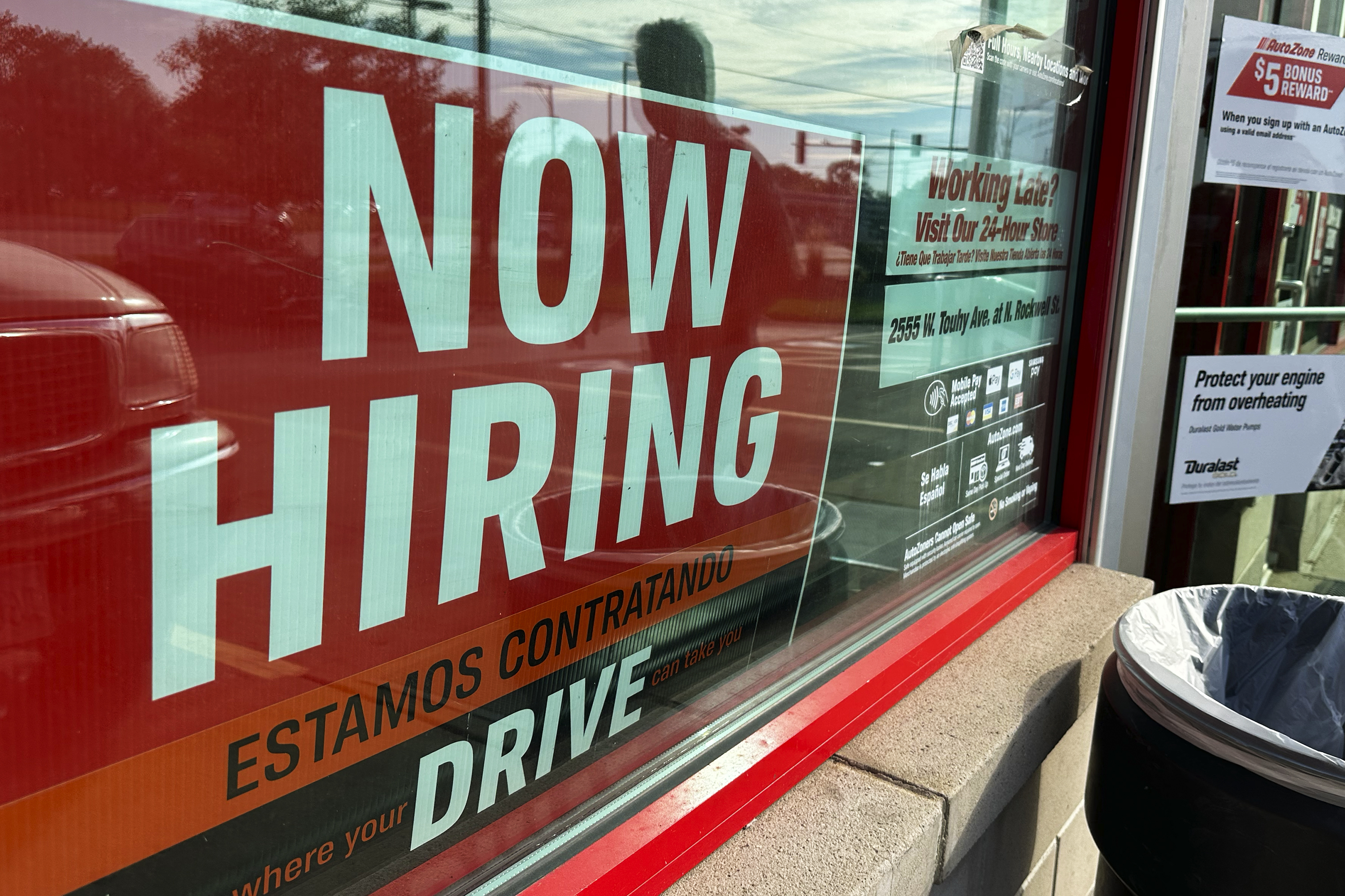 A hiring sign is displayed at a retail store in Wheeling, Ill., Sunday, Sept. 24, 2023. On Thursday, the Labor Department reports on the number of people who applied for unemployment benefits last week. (AP Photo/Nam Y. Huh)