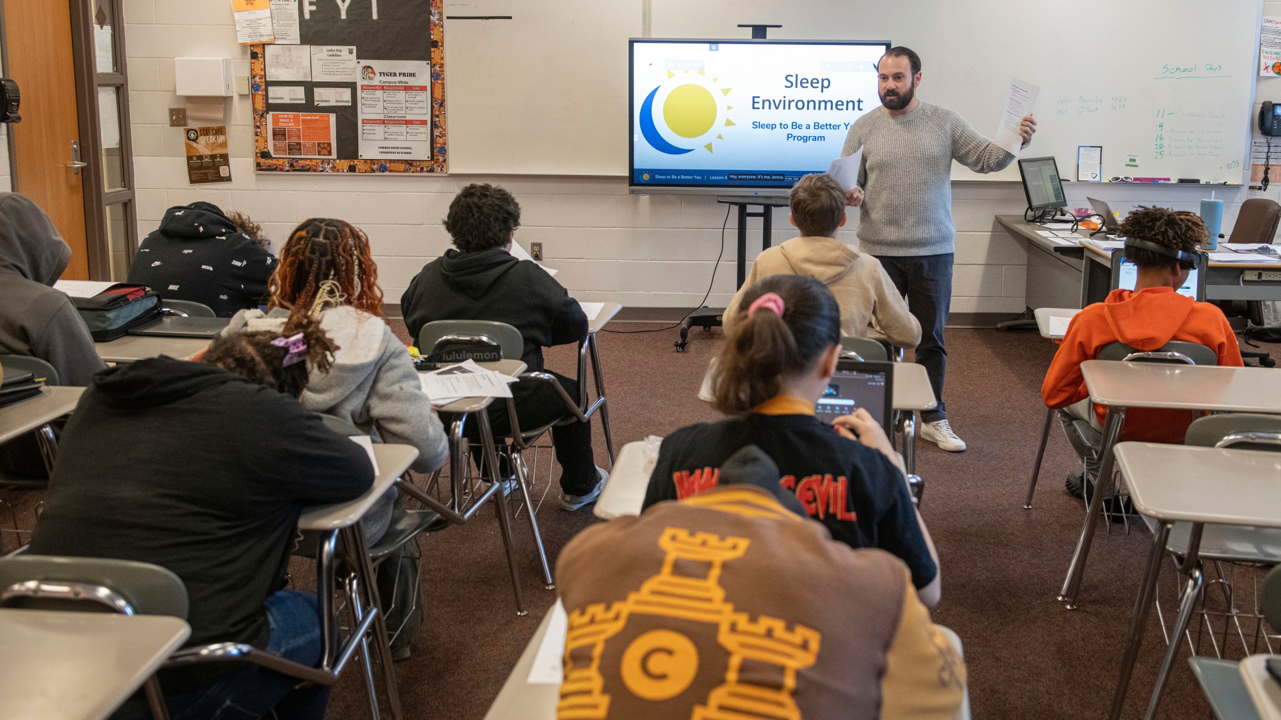 Mansfield Senior High School teacher Tony Davis talks to his health class about the topic of sleep Friday, Dec. 6, 2024, in Mansfield, Ohio. (AP Photo/Phil Long)