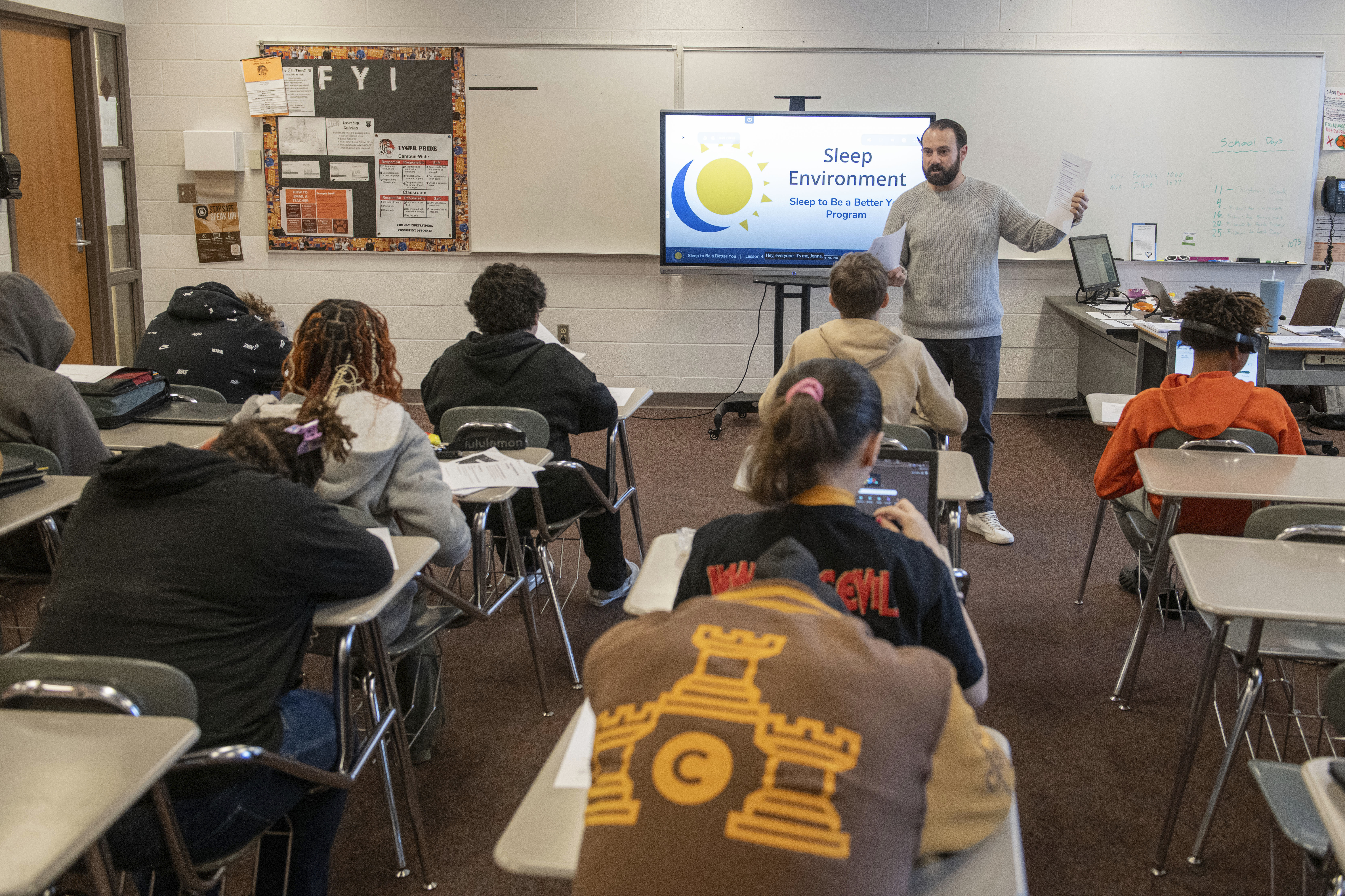 Mansfield Senior High School teacher Tony Davis talks to his health class about the topic of sleep Friday, Dec. 6, 2024, in Mansfield, Ohio. (AP Photo/Phil Long)