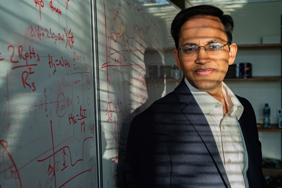 Astrophysicist Nikku Madhusudhan poses for a photo at the Institute of Astronomy at the University of Cambridge, England, April 2025. (Atlantic Studios via AP)